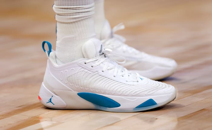 White and blue Jordan Luka 1 shoes.